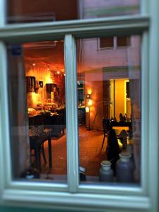 a view from a window of a room with a kitchen at Altstadtpension am Dom in Erfurt +14 photos