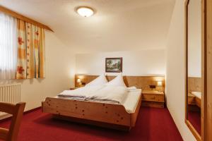Ένα ή περισσότερα κρεβάτια σε δωμάτιο στο Appartment Venter Bergwelt