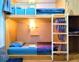 Postel nebo postele na pokoji v ubytování Stay In Chiangrai