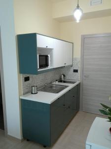 Kuchyň nebo kuchyňský kout v ubytování Casa Zelia