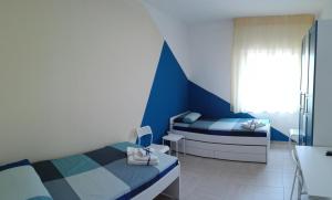 Postel nebo postele na pokoji v ubytování Casa Zelia