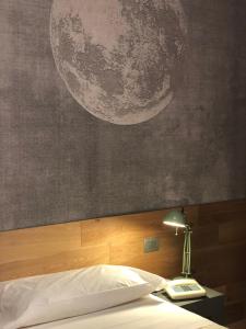 Postel nebo postele na pokoji v ubytování Albergo Tre Pozzi