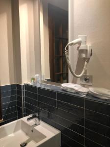 Koupelna v ubytování Albergo Tre Pozzi