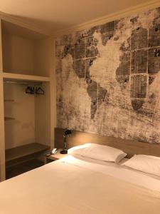 Postel nebo postele na pokoji v ubytování Albergo Tre Pozzi