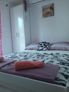 Postel nebo postele na pokoji v ubytování Apartmani Stanković