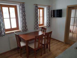 TV a/nebo společenská místnost v ubytování Apartmány Prima Nova Lake