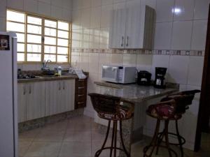 A cozinha ou cozinha compacta de Casa conforto
