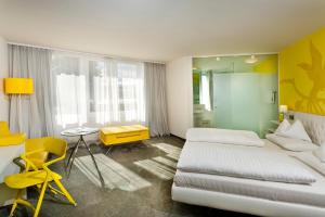 Posteľ alebo postele v izbe v ubytovaní Casinohotel Velden