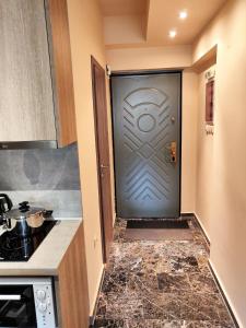 A kitchen or kitchenette at Agias Sofias Street Luxurious Studio