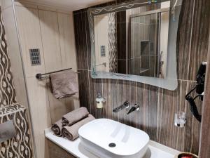 A bathroom at Agias Sofias Street Luxurious Studio