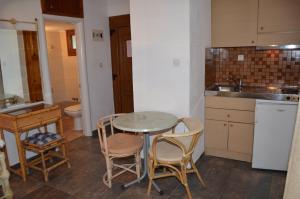 Kuchyň nebo kuchyňský kout v ubytování Hotel Rigakis