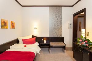 Postel nebo postele na pokoji v ubytování Flair Hotel Werbetal