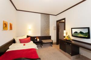 Postel nebo postele na pokoji v ubytování Flair Hotel Werbetal