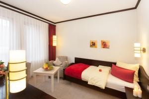 Postel nebo postele na pokoji v ubytování Flair Hotel Werbetal