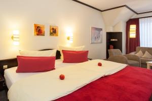 Postel nebo postele na pokoji v ubytování Flair Hotel Werbetal