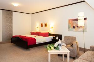 Postel nebo postele na pokoji v ubytování Flair Hotel Werbetal