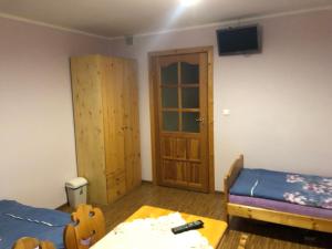 Posteľ alebo postele v izbe v ubytovaní Pokoje Gościnne Pod Gubałówką