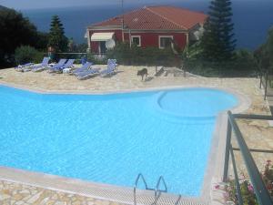 Bazén v ubytování APRAOS BAY HOTEL nebo v jeho okolí