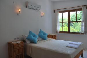 Postel nebo postele na pokoji v ubytování Myra Hotel