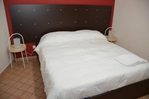 Posteľ alebo postele v izbe v ubytovaní Garibaldi Flat