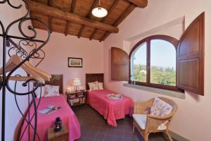 Postel nebo postele na pokoji v ubytování Castello di Pratelli