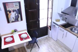 A kitchen or kitchenette at Estudio San Matias Még 20 kép