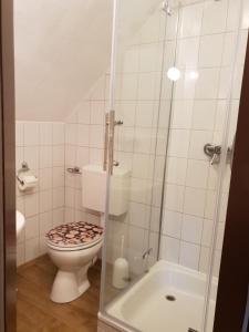 Ein Badezimmer in der Unterkunft Hotel & Restaurant Gulfhof
