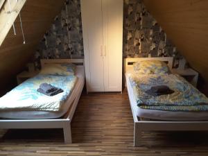 
Ein Bett oder Betten in einem Zimmer der Unterkunft KRIO Klaus Rothfuchs Ferienwohnung 2

