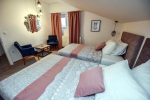 Postel nebo postele na pokoji v ubytování Apartments Miki 2