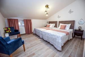 Postel nebo postele na pokoji v ubytování Apartments Miki 2