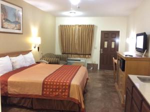 Postel nebo postele na pokoji v ubytování Texas Inn - Welasco/Mercedes
