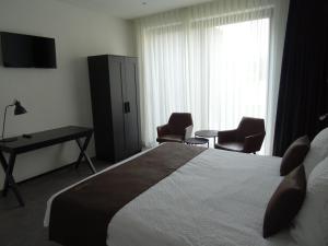 Postel nebo postele na pokoji v ubytování D'Hommelbelle