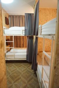 Postel nebo postele na pokoji v ubytování Khoksametchun Hostel