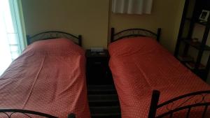 Voodi või voodid majutusasutuse Cozy Loft toas