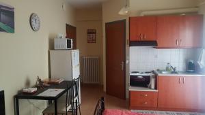 Köök või kööginurk majutusasutuses Cozy Loft