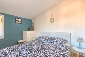 Postel nebo postele na pokoji v ubytování Brijuni Loft