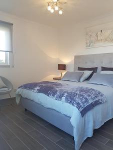 En eller flere senge i et værelse på Jardins do Golf, Val do Lobo