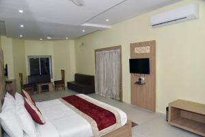 A television and/or entertainment centre at The River Front Resort