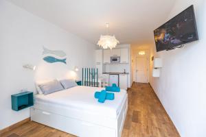 Postel nebo postele na pokoji v ubytování Vivienda Vacacional Paradise