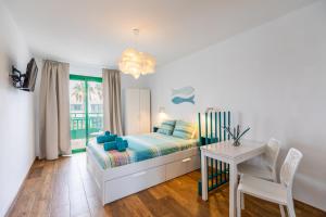 Postel nebo postele na pokoji v ubytování Vivienda Vacacional Paradise