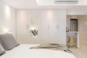 מיטה או מיטות בחדר ב-Camps Bay Nest