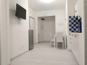 TV a/nebo společenská místnost v ubytování Sorrento Blue Eyes Apartment