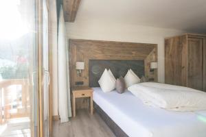Postel nebo postele na pokoji v ubytování Hotel Glöckner und Hotel Residenz Glöckner