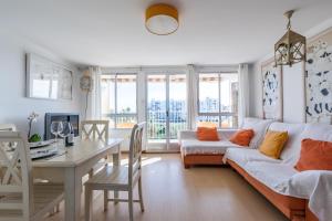 TV a/nebo společenská místnost v ubytování Apartamento Calipso