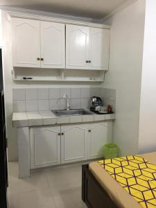 Kuchyň nebo kuchyňský kout v ubytování Bing's Place