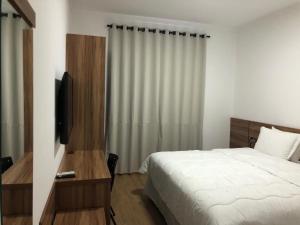 Postel nebo postele na pokoji v ubytování Hotel Matrix