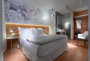 Cama o camas de una habitación en Hotel Párraga Siete