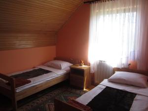 Postel nebo postele na pokoji v ubytování Guest House Sveti Marko Gacka