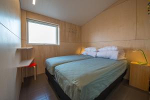 Postelja oz. postelje v sobi nastanitve Apartment in the country, great view Apt. B