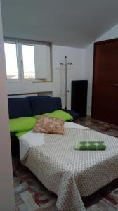 Un pat sau paturi într-o cameră la Appartamento A Campobasso